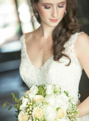 Bride's dress. Bride with flowers