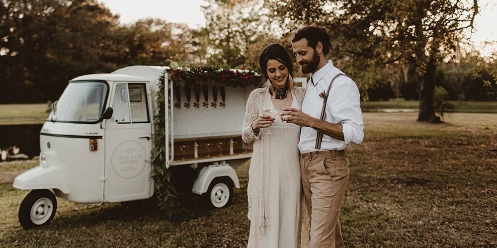 A fixed up vintage Piaggio Ape, “The Chuglette” is an adorable way to serve drinks to your wedding guests.