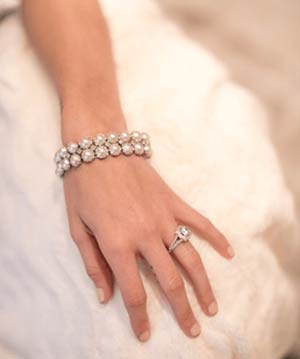 A bride with wedding jewelry. Photo supplied by Loy Harn Jewelers.