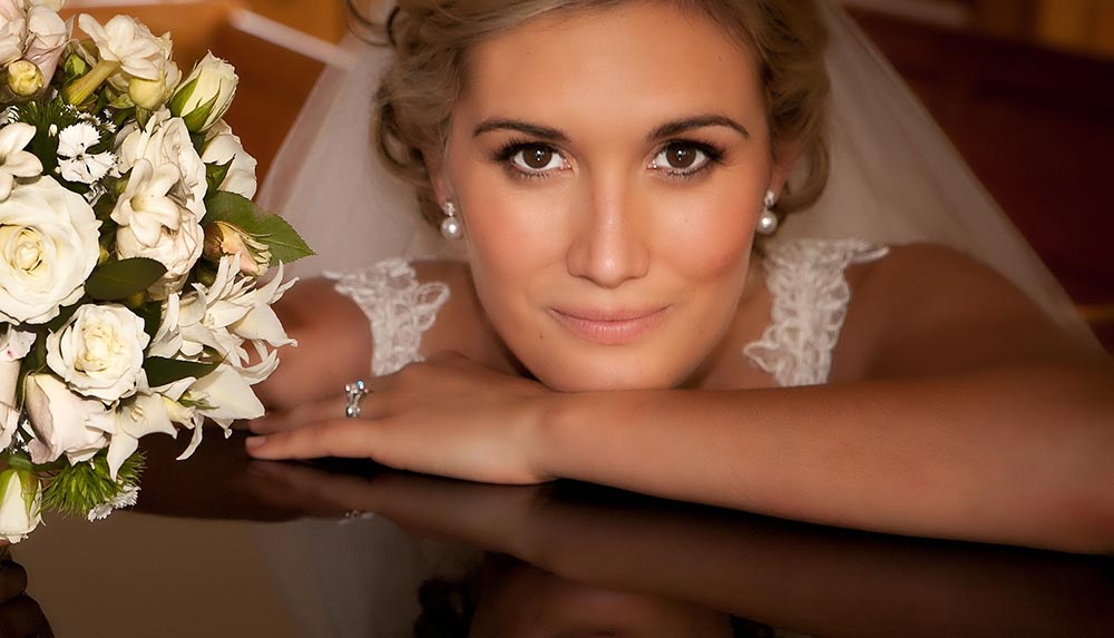 A beautiful bride in Charleston, SC smiling