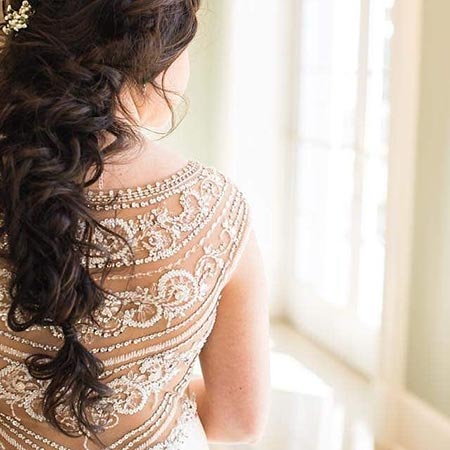 A bride looks out the window as she ponders her future