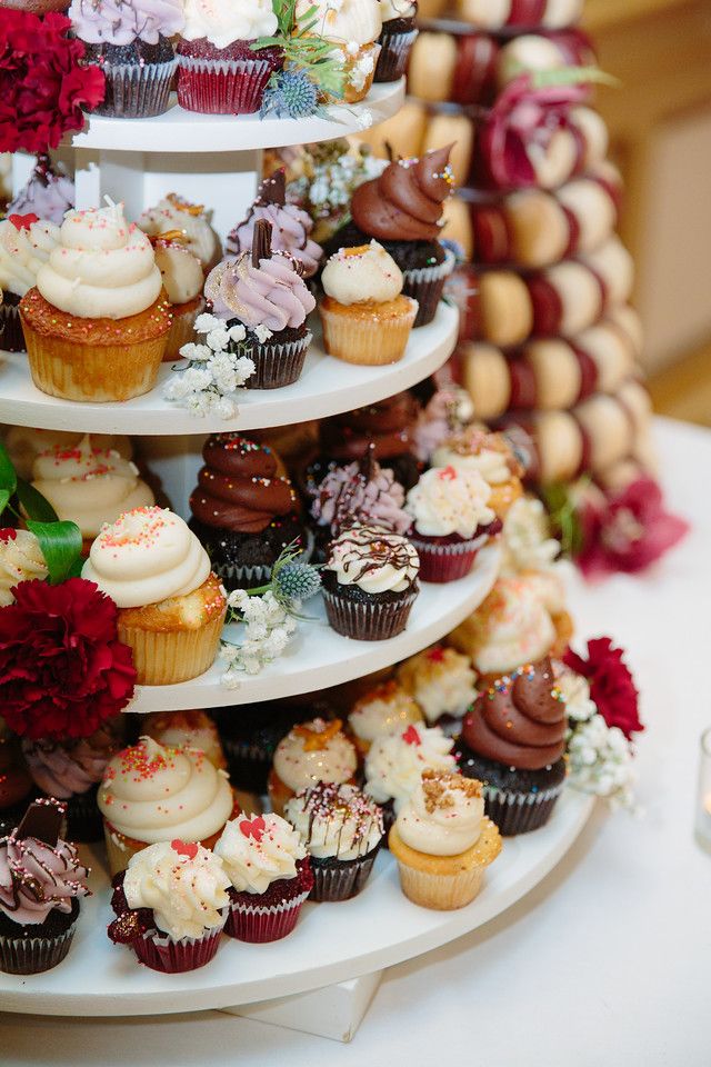 A beautiful arrangement of cupcakes provided by one of the preferred wedding cake vendors of the Francis Marion Hotel.